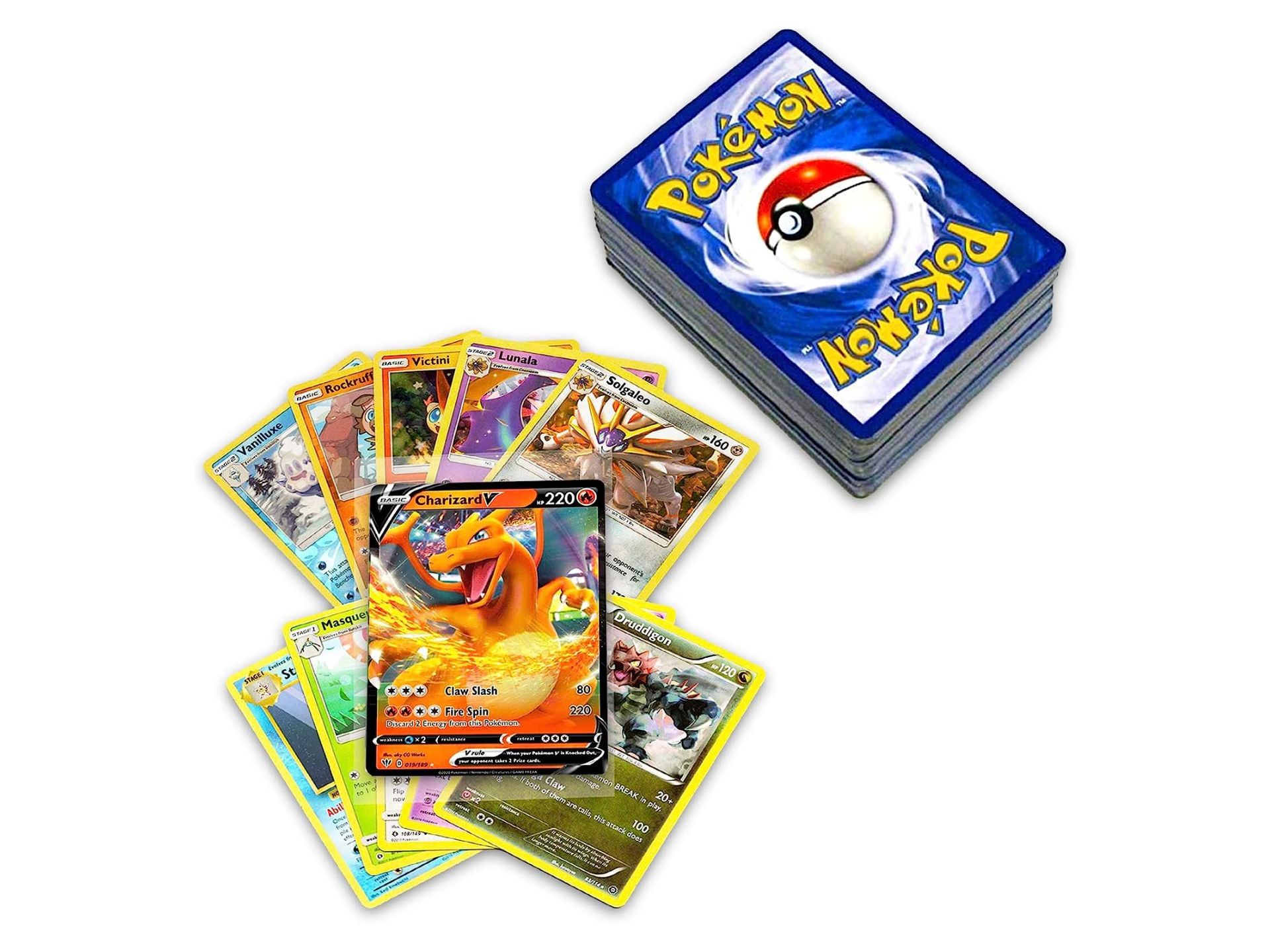 A deck of Pokémon cards next to several cards laying face-up