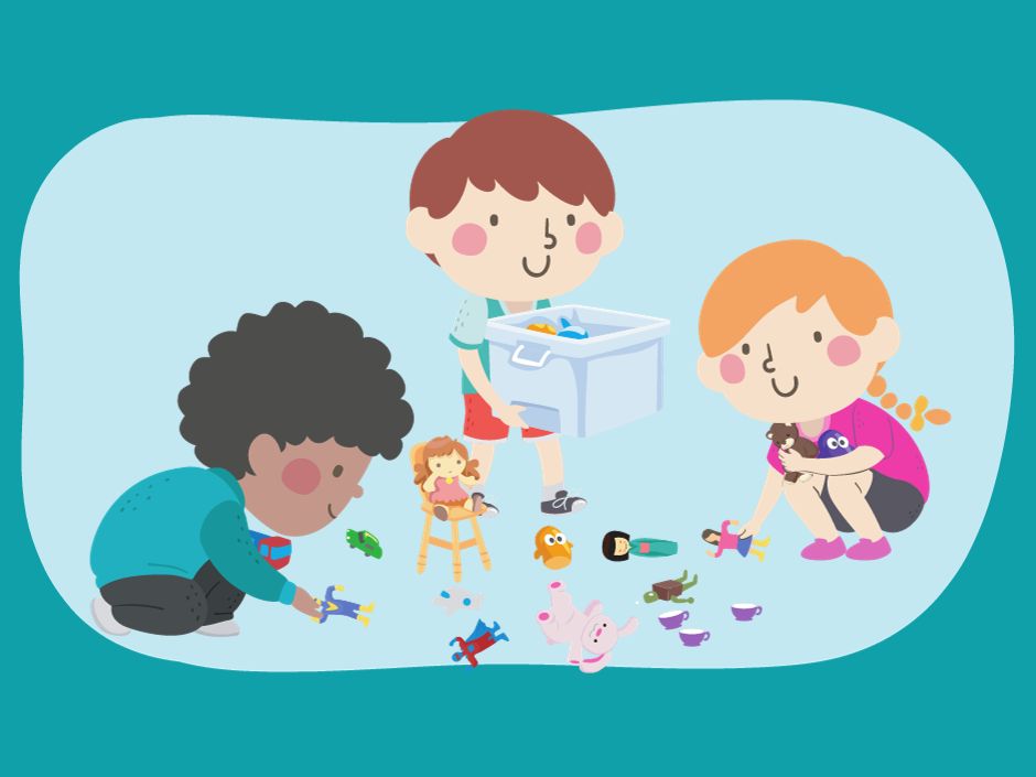 three children cleaning up toys