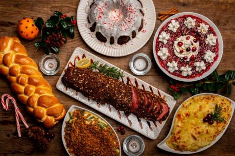 A holiday meal spread out on a wooden table.