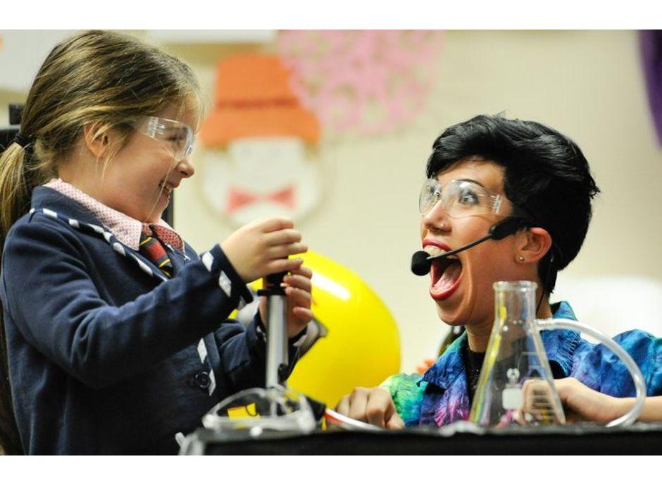 Adult and child doing science experiment